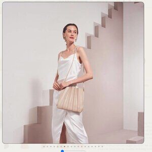 Brand New Accordion Handbag with removable accessory bag